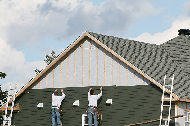 Professional Siding Installation technician working in Auburn, NY